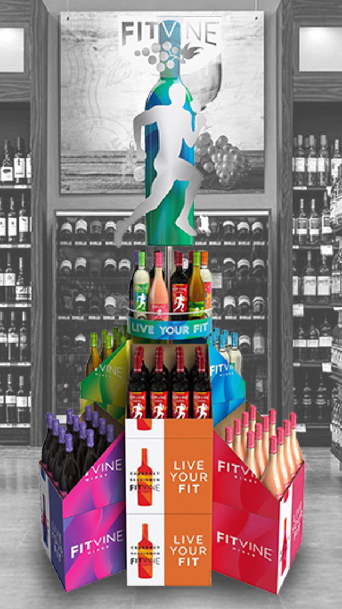 Wine freestanding retail tower display with multi-varietal bottles and “Live Your Fit” messaging, designed by Agency Squid.
