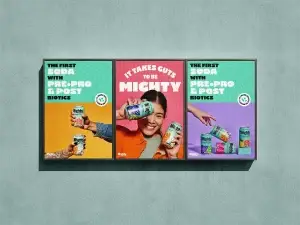 Mighty Pop prebiotic and probiotic soda cans showing colorful packaging for the One Big Campaign.