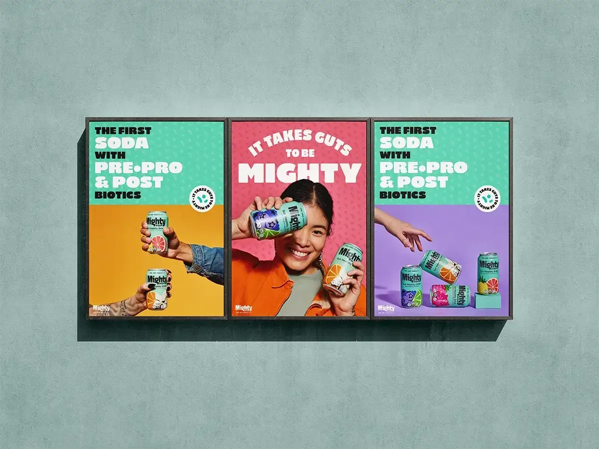 Mighty Pop prebiotic and probiotic soda cans showing colorful packaging for the One Big Campaign.