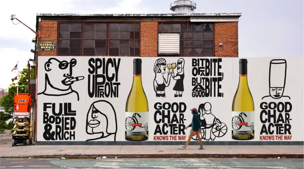 Large illustrated street mural promoting Harken Chardonnay with bold characters, wine bottles, and the message “Good Character Knows the Way” in an urban setting.