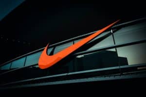 nike logo on black background